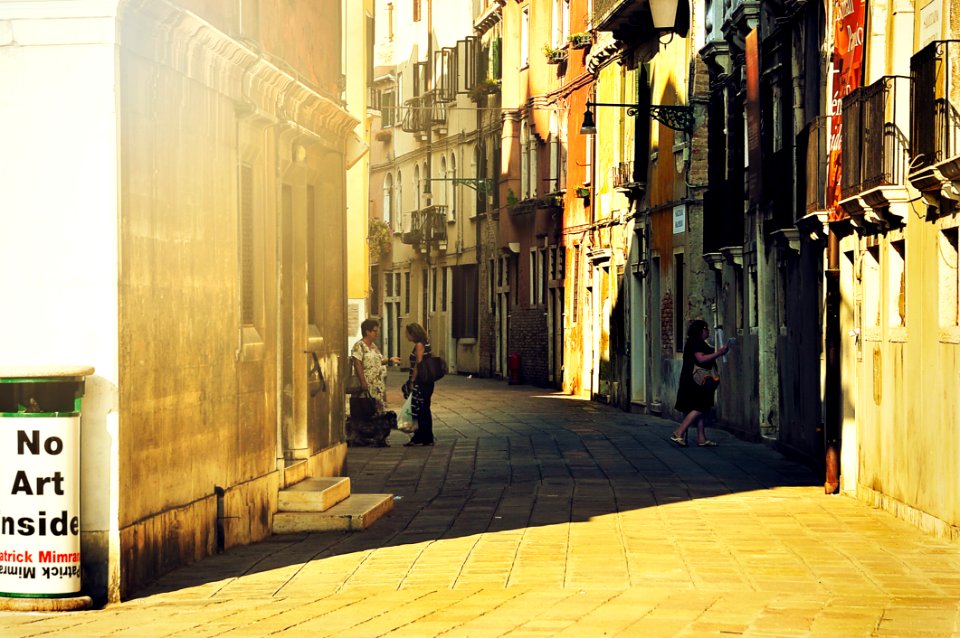 3 Person Standing In Alley photo