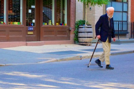 Senior Man With Walking Stick photo