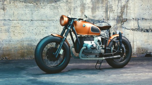 Orange And Black Bmw Motorcycle Before Concrete Wall photo