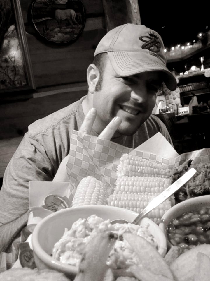Man Eating At Restaurant