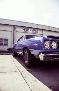 Blue Muscle Car Outside Photo Crafts Building photo