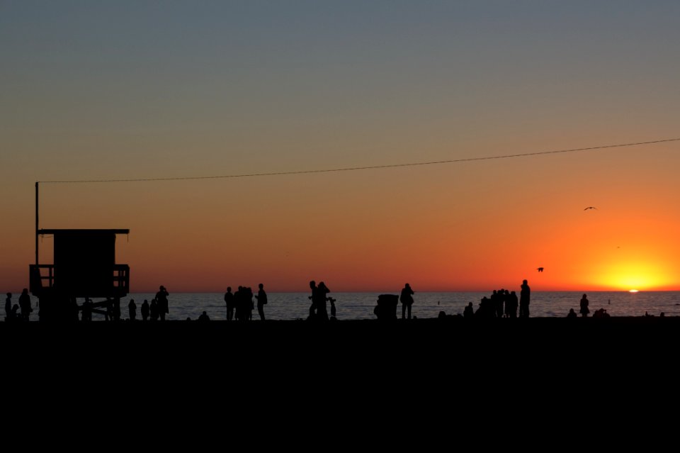 People Standing On Beach