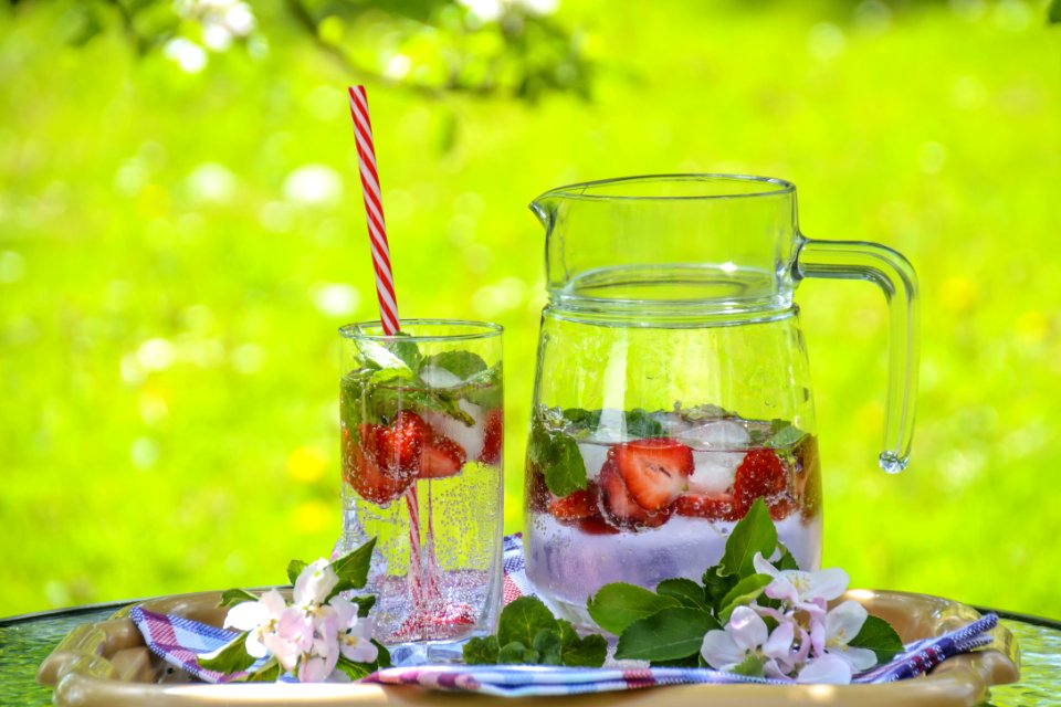Clear Glass Pitcher With Water And Strawberry
