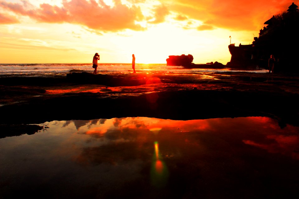 People On Low Tide During Sunrise