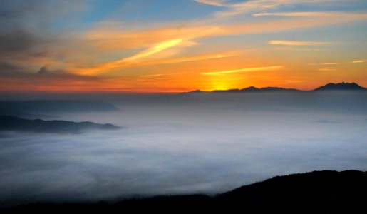 Sunset Over Misty Mountains