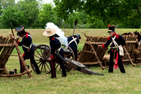 The Mexican artillery goes into action at the annual Battle of San Jacinto Festival and Battle Reenactment, a living-history retelling and demonstration of the historic Battle of San Jacinto. This was the decisive battle of the Texas Revolution. Led by General Sam Houston, the Texian Army engaged and defeated General Antonio López de Santa Anna's Mexican army in a fight that lasted just 18 minutes. Santa Anna, the President of Mexico, was captured the following day and held as a prisoner of war. Three weeks later, he signed the peace treaty that dictated that the Mexican army leave the region, paving the way for the Republic of Texas to become an independent country. Original image from Carol M. Highsmith’s America, Library of Congress collection. photo