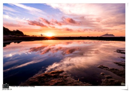 Sunset Over Coastline photo