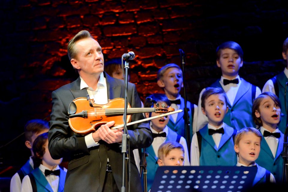 Group Of Young Boys Singing In A Choir