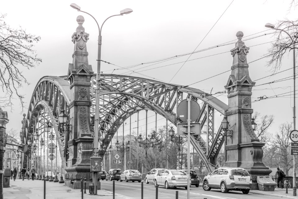 Greyscale Photo Of A Bridge With Cars Being Caught In A Traffic During A Snow Weather photo