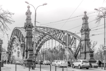 Greyscale Photo Of A Bridge With Cars Being Caught In A Traffic During A Snow Weather photo