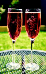 Two Wine Glass On Grey Metal Round Table photo