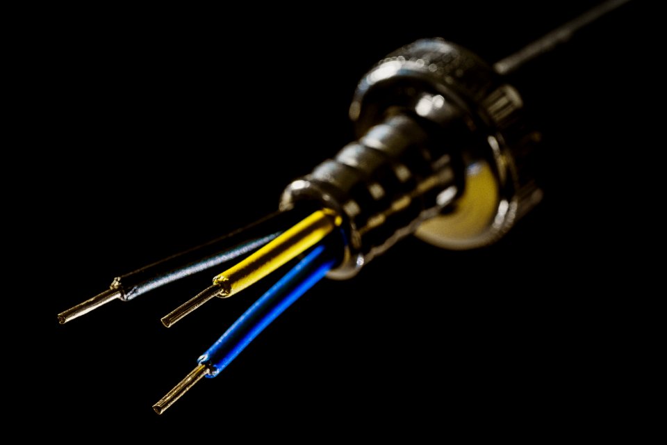 Yellow Coated Wire Near Black And Blue Coated Wire