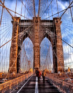 Two Person Walking On Bridge During Daytime photo