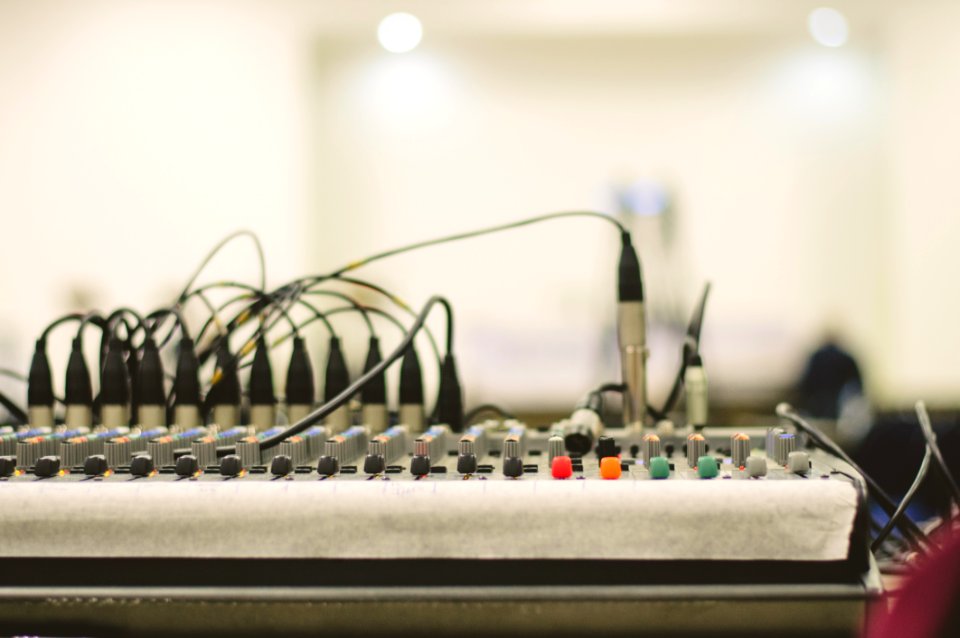 Black Electronic Device On White And Brown Table