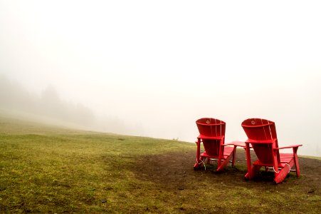 Brown Wooden Beach Lounge Chair On Brown And Green Grass Field photo