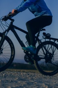 Person Riding On Black Mountain Bike During Night Time photo