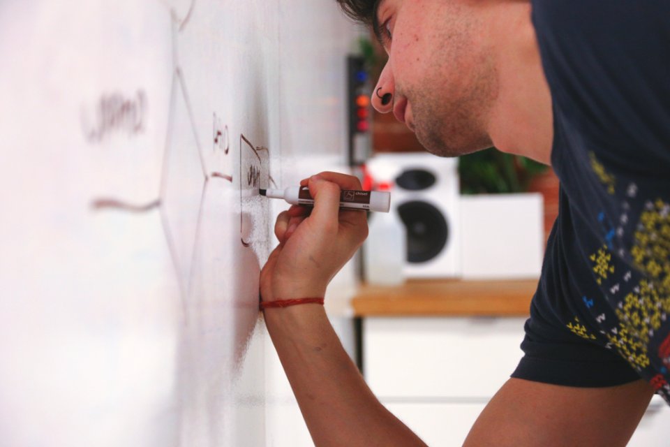 Man Writing On Whiteboard