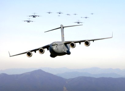Grey Cargo Plane Flying