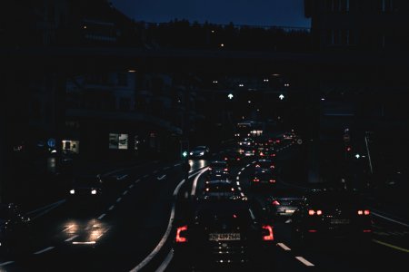 Cars On Roadway At Night photo