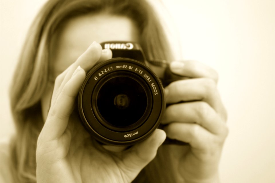 Woman Taking A Picture Using Canon Dslr