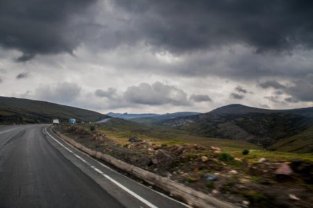 Road Near Brown Stone During Cloudy