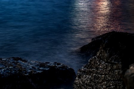 Sunset Over Rocks On Coastline photo