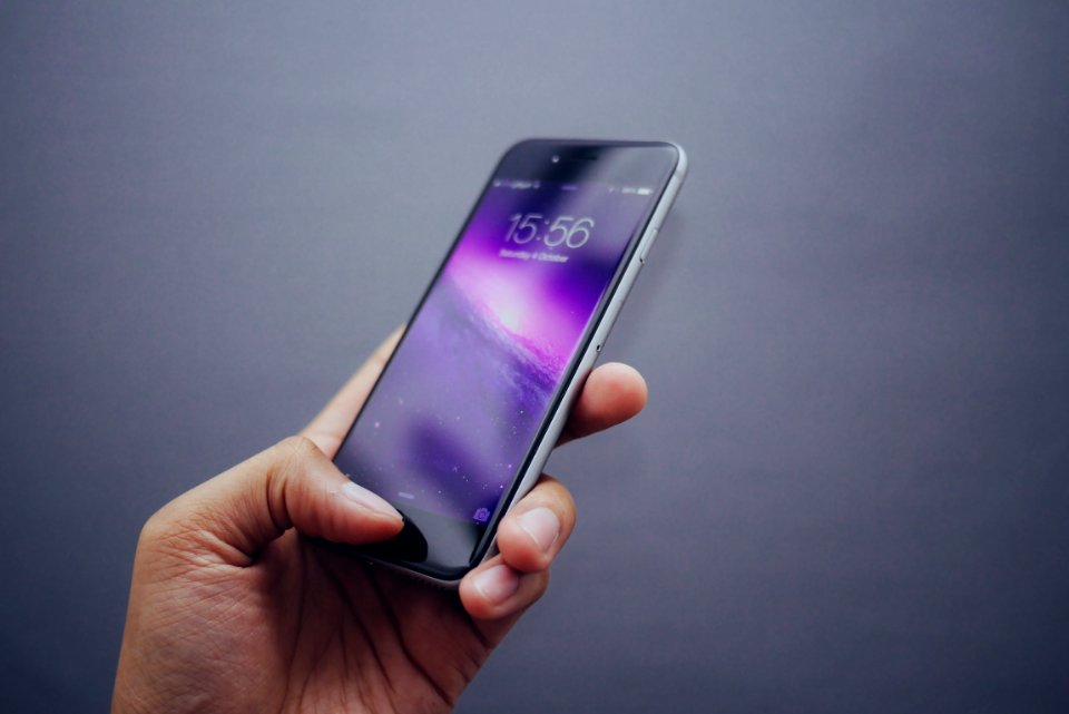 Hand Holding Apple IPhone