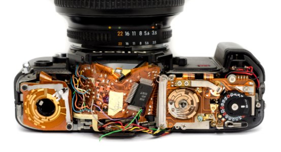 Black Dslr Camera Showing Its Circuit Board