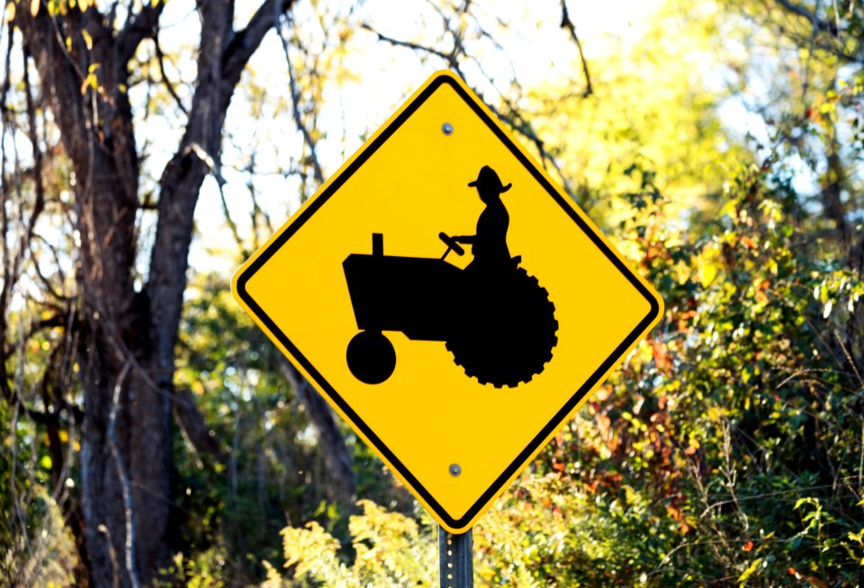 Road sign of slow moving tractor in Holmes County, Ohio. Original image from Carol M. Highsmith’s America, Library of Congress collection.