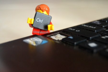 Toy Man Removing Computer Key