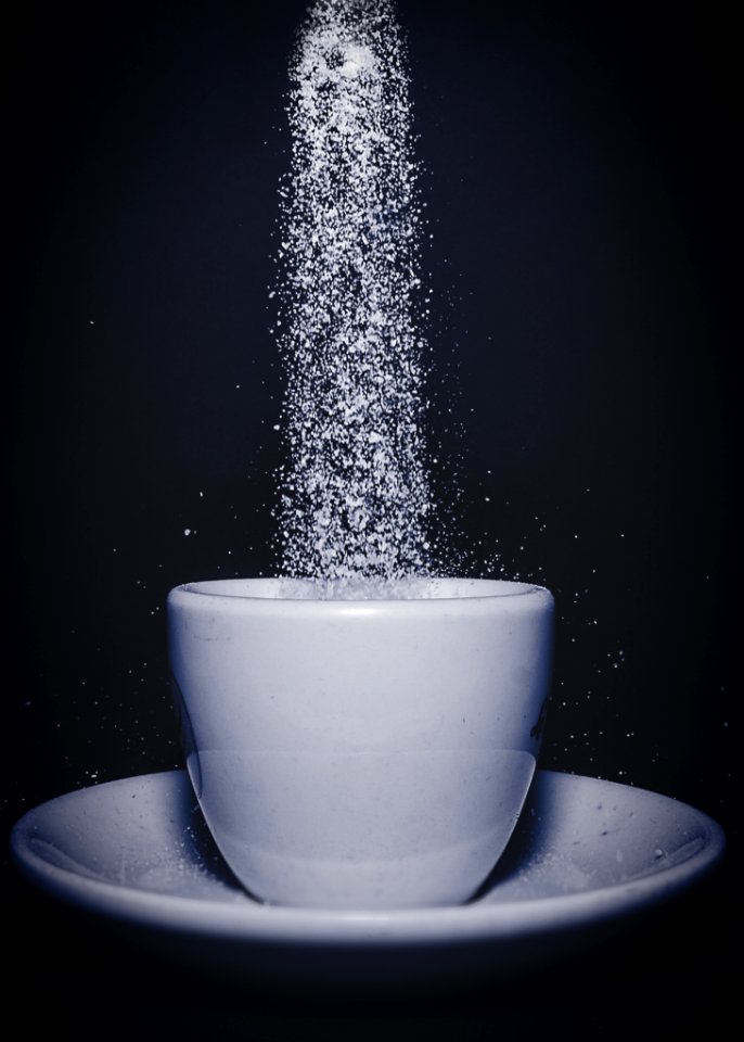 Sugar Falling Into Cup