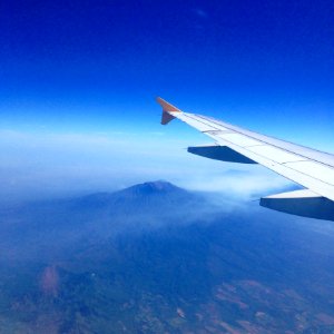 Wing Of Plane Over Mountains photo
