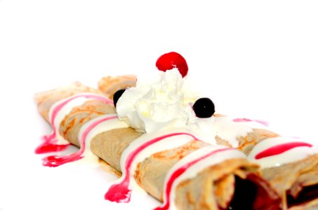 Cherry And Whipped Cream Topped Crepe