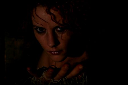 Portrait Of Woman In Shadows