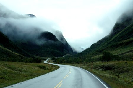 Winding Road Through Mountain Fog photo