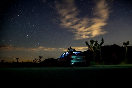 Gray Suv Under Blue Starry Sky During Nighttime