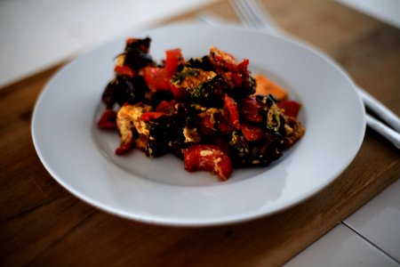 Black And Red Dish On White Plate photo