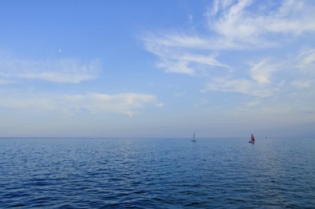 Sailboats On Calm Blue Sea photo