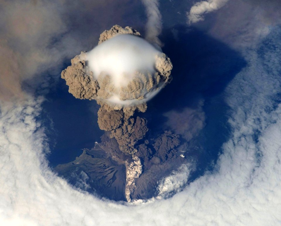 Top View Of Volcano Erupting During Daytime