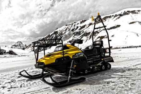 Yellow And Black Snowmobile photo