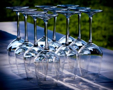 Clear Long Stem Wine Glass On Clear Surface photo