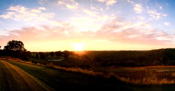 Sunset Over Rural Hillside
