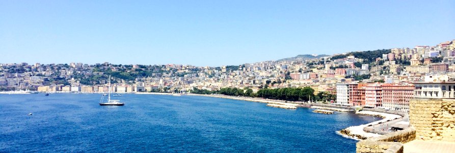 Black Ship On Blue Sea During Daytime photo