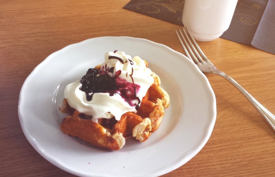 White Ceramic Plate Beside Stainless Steel Dining Fork