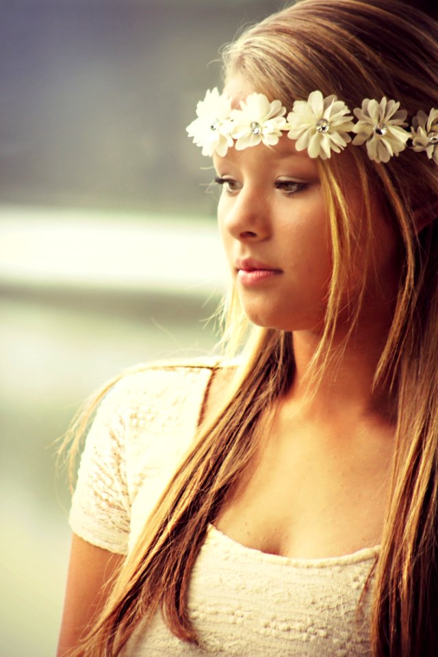 Woman Wearing Floral Headdress