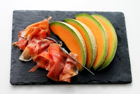 Melon On Black Tray