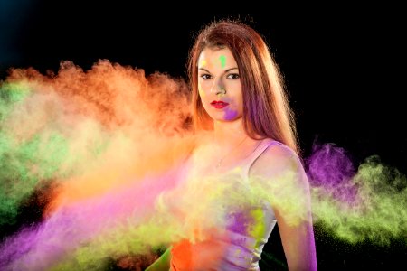 Portrait Of Woman In Colorful Smoke