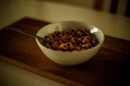 Cereal On White Ceramic Bowl With Spoon
