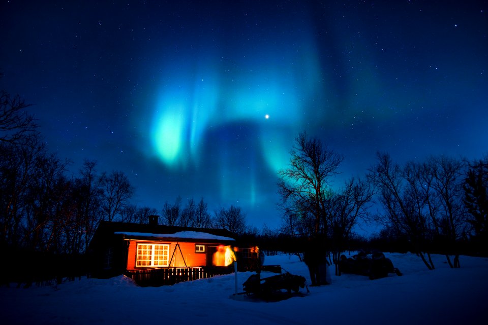 Brown Cottage Under Aurora