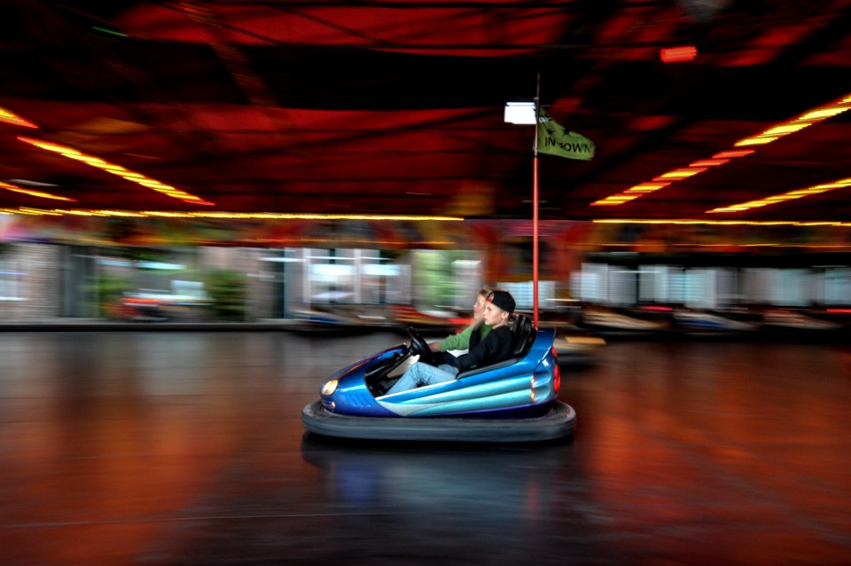 Riders In Bumper Car